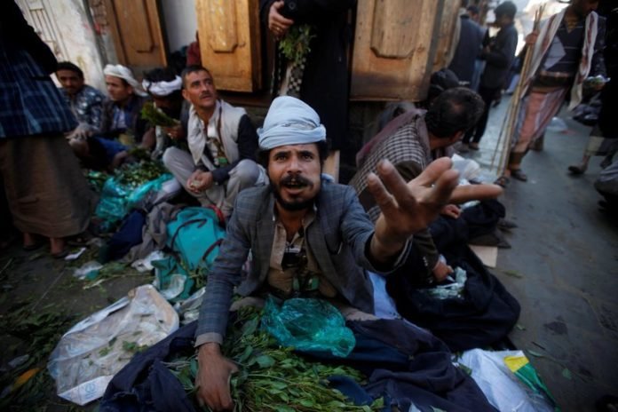 A man sells qat at the old city of Sanaa